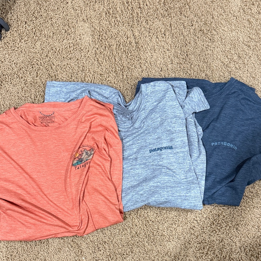 3 Patagonia Short Sleeve Tees in Coral, Light Blue, and Navy